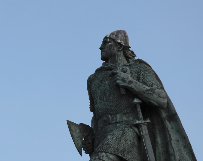 Leifr Eiríksson sculpture by A.S. Calder with Cross and in chainmail with sword and battleaxe —  the Old Evangelization